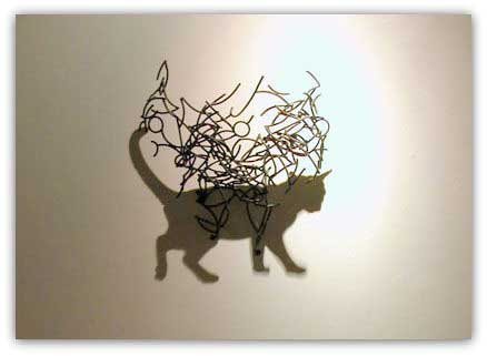 Sculture di ombre, Larry Kagan, gatto